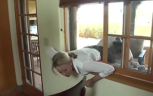 Mom gets help from sons being stuck in window