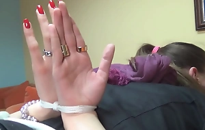 Girl promised in bondage at hand palms out