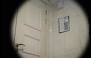 Sexy spycam redhead in bathroom